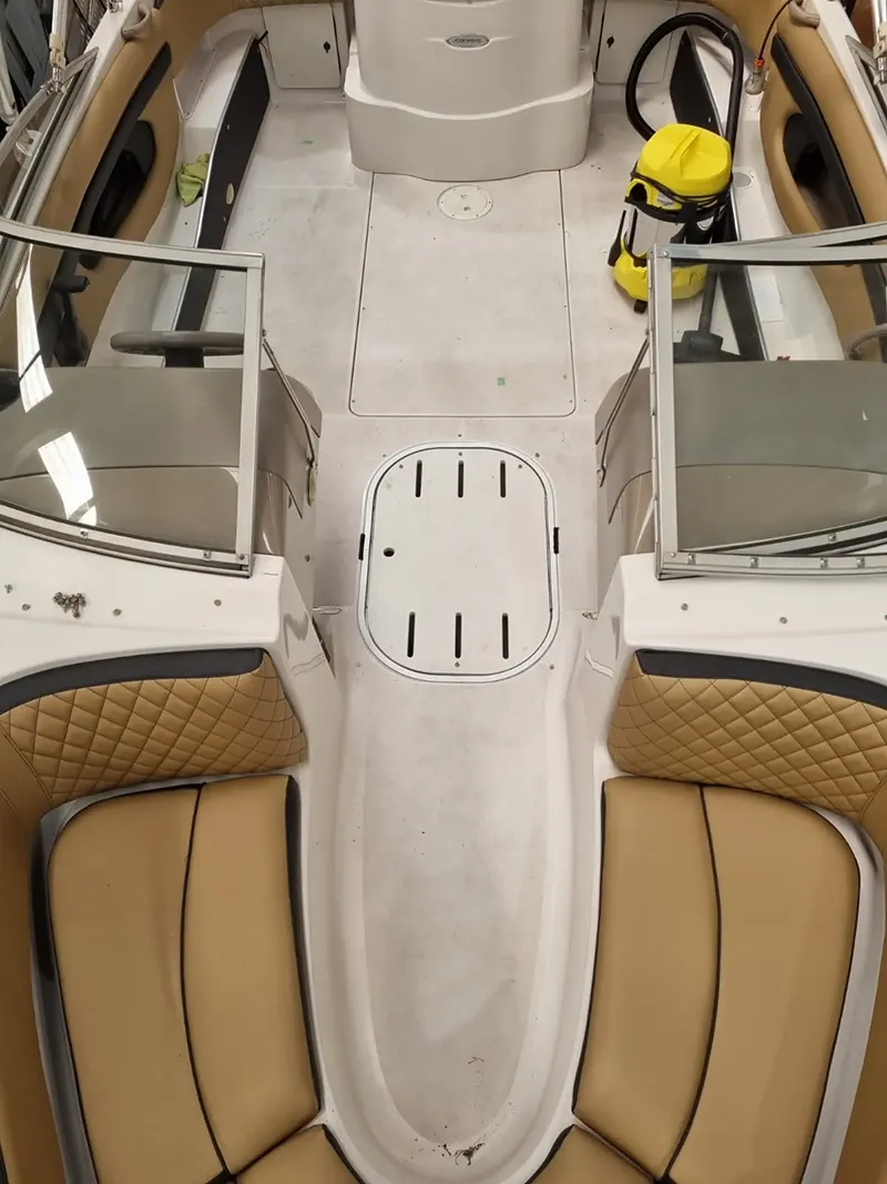Boat deck before custom marine flooring installation in a workshop