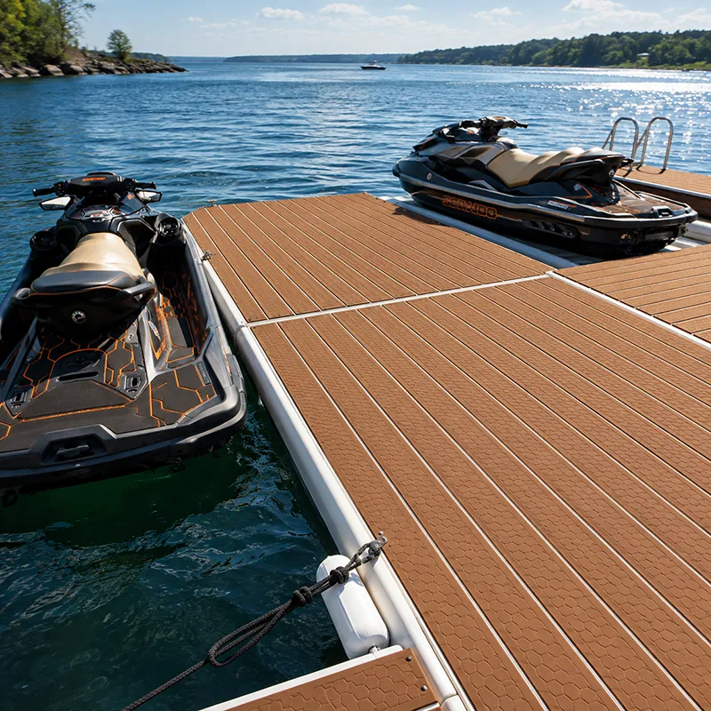 Marine foam flooring installed on a dock beside personal watercraft